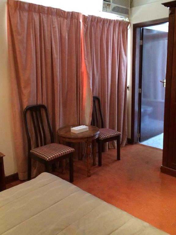 City Center Hotel Манама Стая снимка