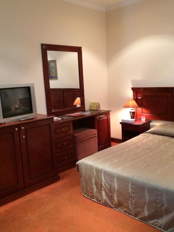 City Center Hotel Манама Стая снимка