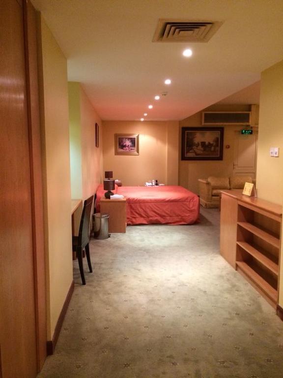 City Center Hotel Манама Стая снимка