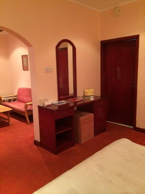 City Center Hotel Манама Стая снимка