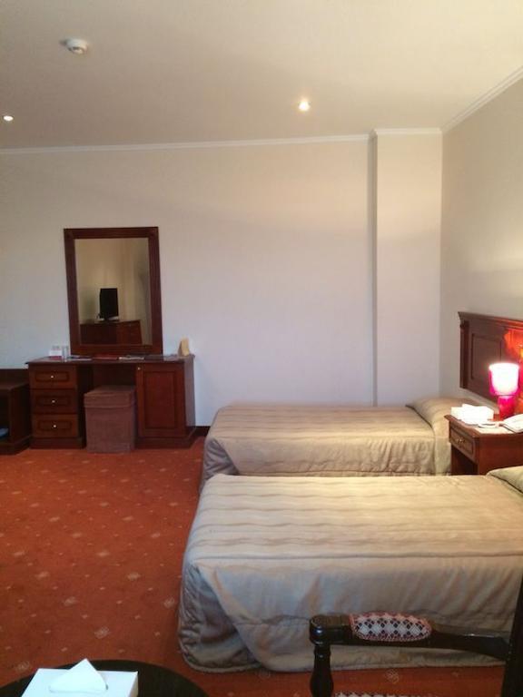 City Center Hotel Манама Стая снимка