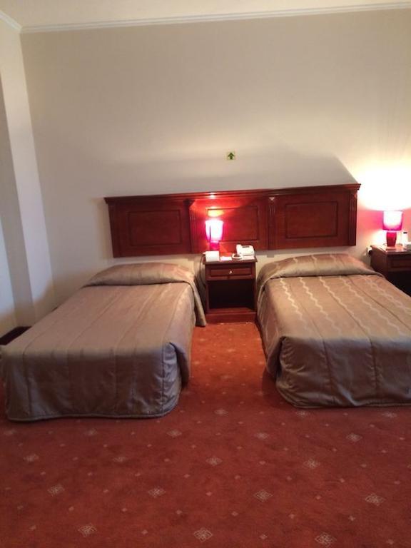 City Center Hotel Манама Стая снимка